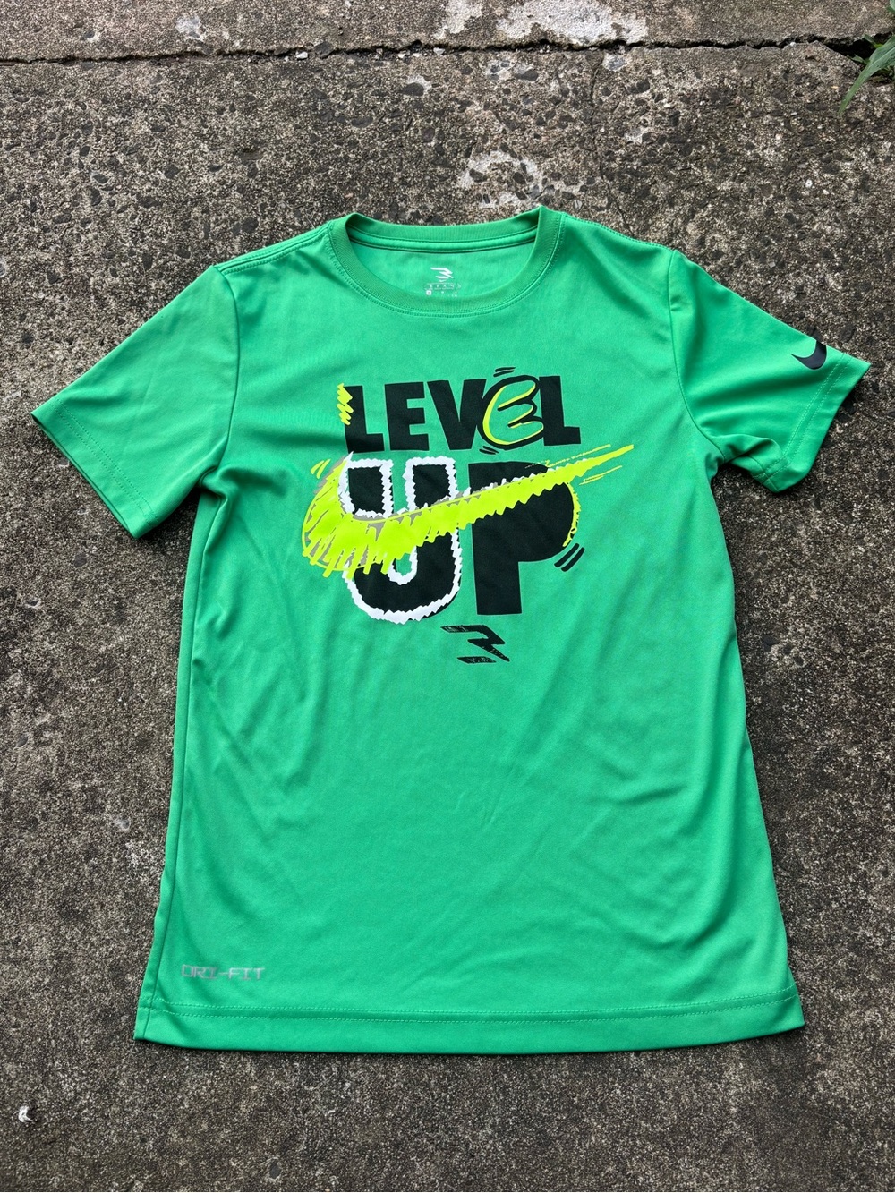 Nike Green Short Sleeve 'Level Up' Graphic Tee with Neon Yellow Swoosh